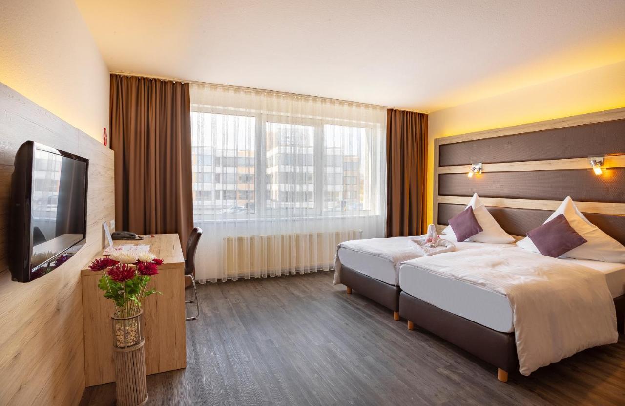 Michel Hotel Frankfurt Airport Russelsheim Bagian luar foto